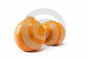 Two tangerines isolated closeup