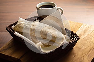 Two tapioca and a cup of coffee.