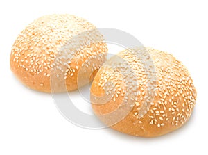 Two tasty baked rolls with sesame isolated