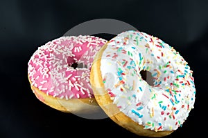 Two tasty but unhealty donuts photo