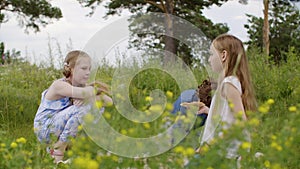 Two teen girls offended boy sitting on glade together and he got up and left.