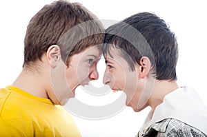 Two teenage boys screaming at each other