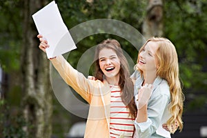 Two Teenage Girls Celebrating Successful Exam Results