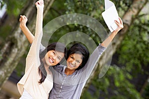 Two Teenage Girls Celebrating Successful Exam Results