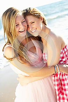 Two Teenage Girls Enjoying Beach Holiday