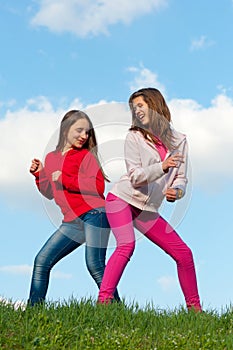 Two teenage girls having fun outdoor