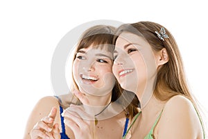 Two teenage girls looking up