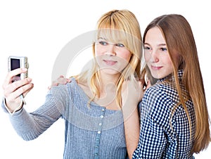 Two teenage girls photographing on camera