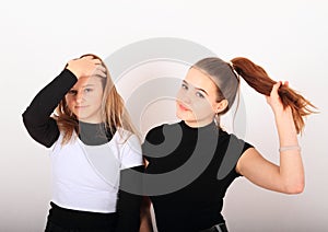 Two teenage girls smiling friends