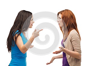 Two teenagers having a fight