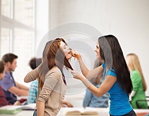 Two teenagers having a fight and getting physical