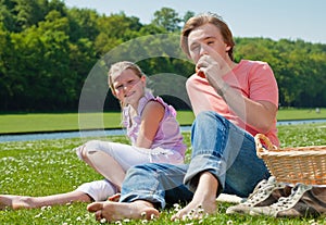 Two teenagers having picnic