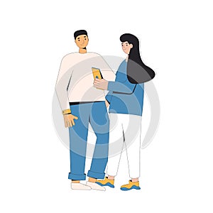 Two teenagers standing together. Young male and female friends wearing in casual clothes. Pair standing and hugging each other