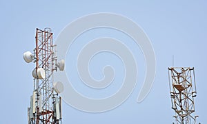 Two Telecommunication antenna tower in parallel.