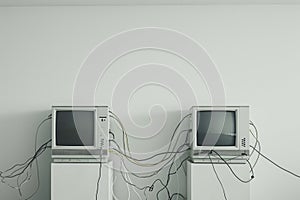 Two televisions are connected to each other in a room, creating a visual display of interconnectivity, Computers connected by