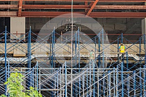 Two Thai laborers at work site