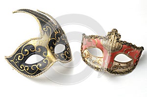 Two theater mardi gras venetian masks on white background