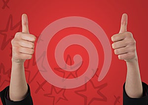 Two thumbs up against red background with hand drawn star pattern