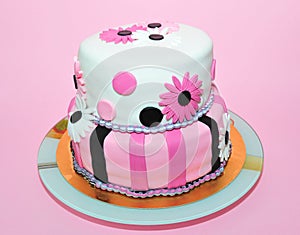 Two tier pink and white fondant cake