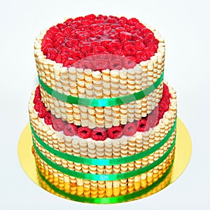 Two tier vanilla cake decorated with finetti stick