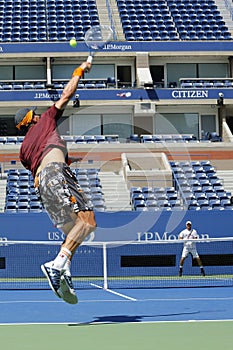 Two times Grand Slam Champion Lleyton Hewitt and professional tennis player Tomas Berdych practice for US Open 2014