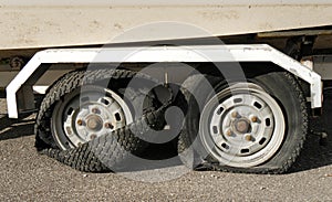 Two tires totally destroyed on trailer