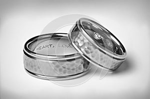 Two Titanium Silver Wedding Bands On White