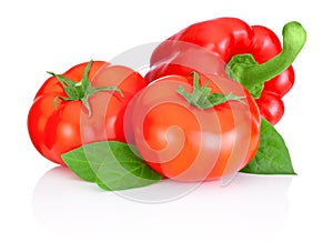 Two tomatoes, Sweet Red Peppers and leaves isolated on white b