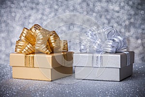 Two tone gift boxs with silver gold ribbon