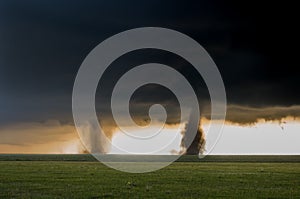 Two tornadoes touch down simultaneously in the plains of eastern Colorad..