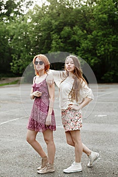 Two toung attractive girls posing
