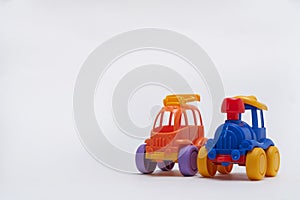 Two Toy cars on white background Copy space