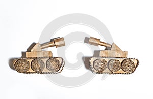 two toy tanks made by children from corrugated cardboard. toy cardboard tanks isolated on a white background