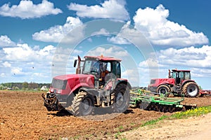 Two tractors on the field