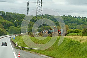 Two Tractors Parked on Roadside