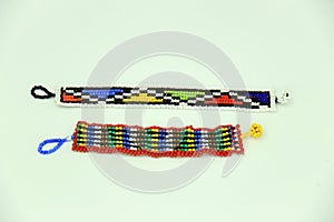 Two traditional bright beaded zulu bracelets isolated