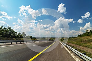 Two traffic lanes and a yellow dividing lane on the side of the M4 don motorway