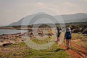 Two travellers wandering on a cyprian coast