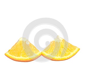 Two triangle slices of orange isolated on white background