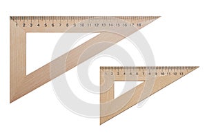 Two triangular ruler made of wood 20 and 15 centimeters on a white, isolated background. photo
