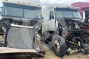 Two trucks after accident crashed, disposal of the car, cargo van broken in a road crash, destroyed