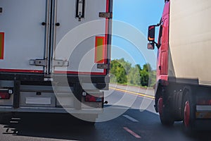 Two trucks on the highway