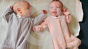 two twin babies. newborn a happy family kid kid dream concept. portrait of two twins boy and girl. love young infant