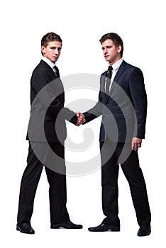 The two twin brothers handshaking isolated on white