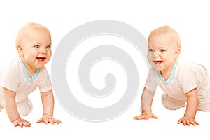 Two twins babies crawling, peering and laughing.