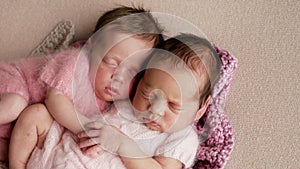 Two twins newborn sleeping