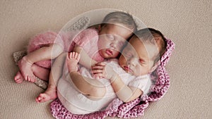 Two twins newborn sleeping