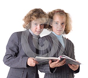 Two twins with textbook
