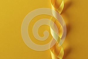 Two twisted yellow ribbons