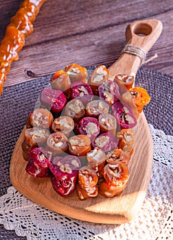 two types of oriental sweetness - churchkhela made from natural plum and apple juice